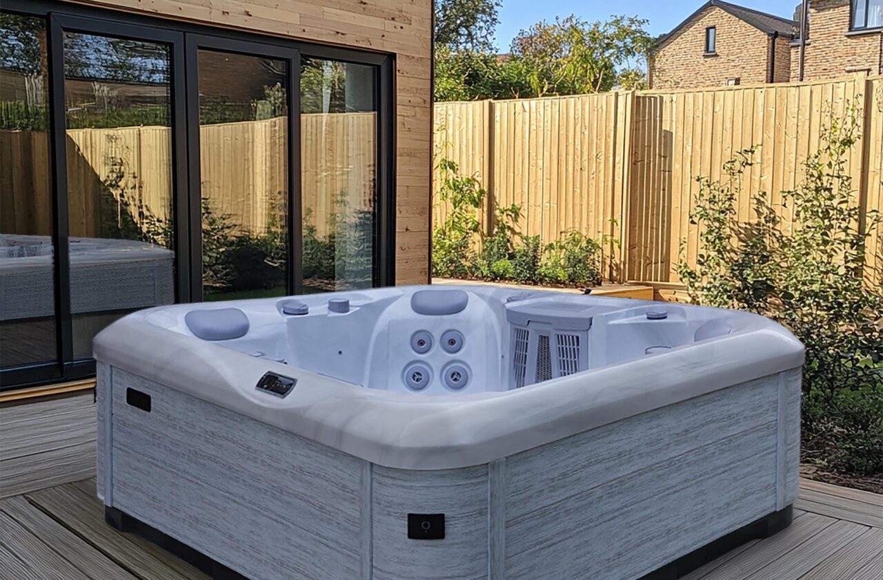AquaSolus Brook hot tub in a garden